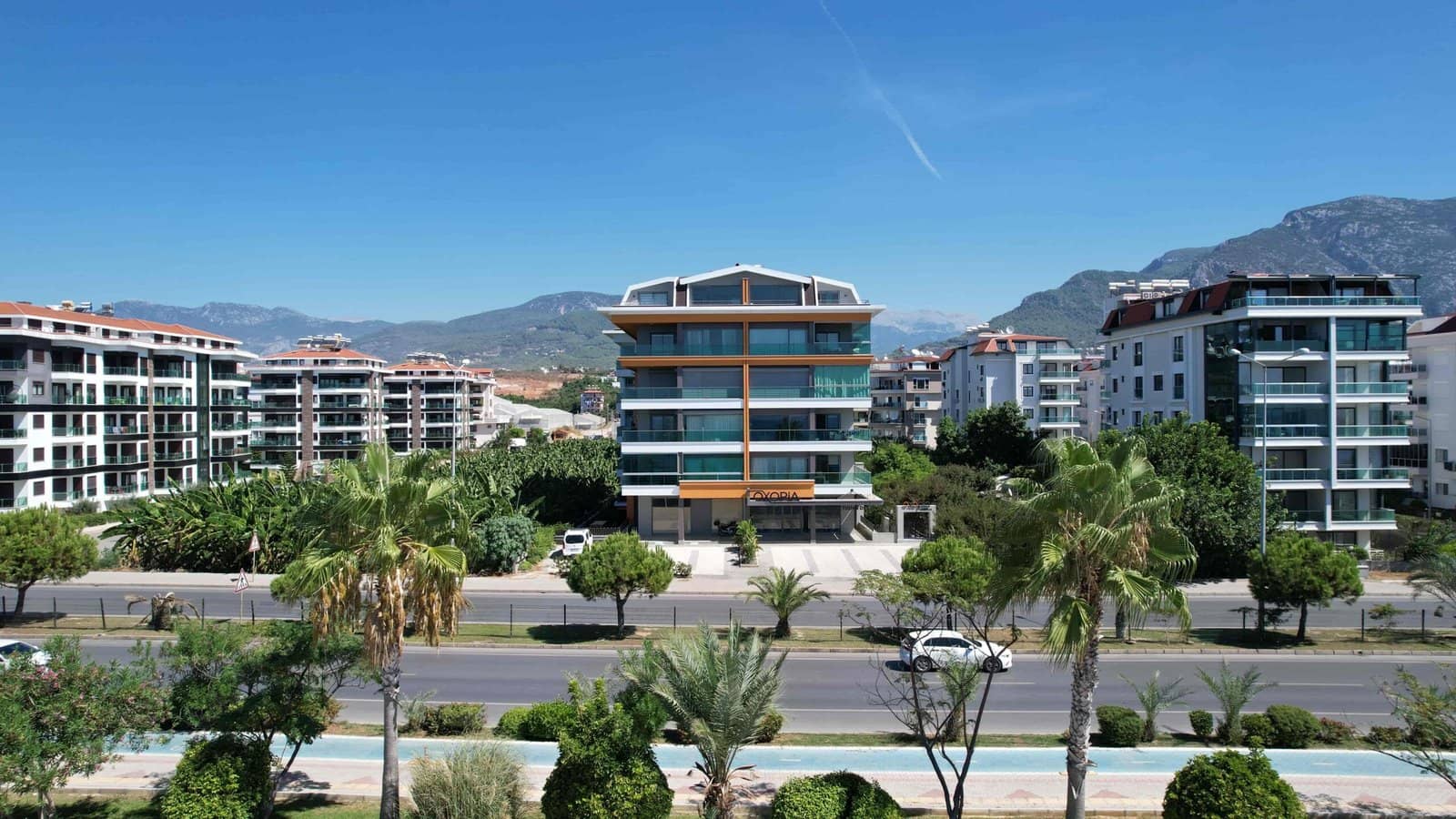 entrance and outdoor car park area and road